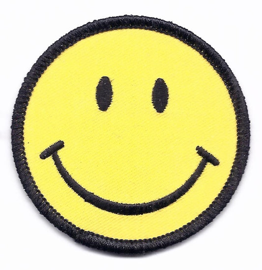 smile face fun embroidered patch: 2.5" . Patches have an iron-on backing & are carded for a display rack for retailers.