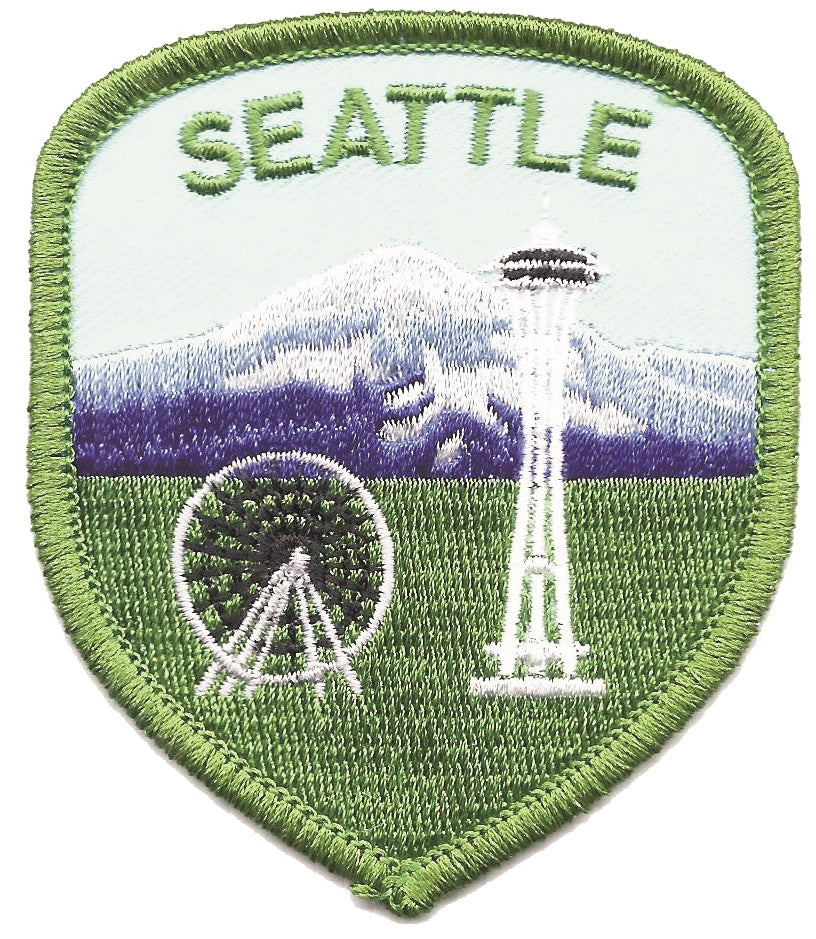 SEATTLE space needle, ferris wheel, & Mt. Rainier shield souvenir embroidered patch. 2.5" wide x 3" tall. Patches are carded for a retail display for stores.